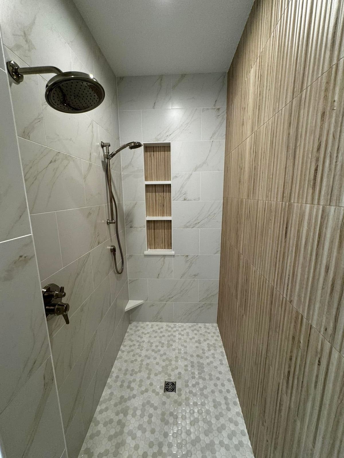 Tile wall installation by Bellkey Tile